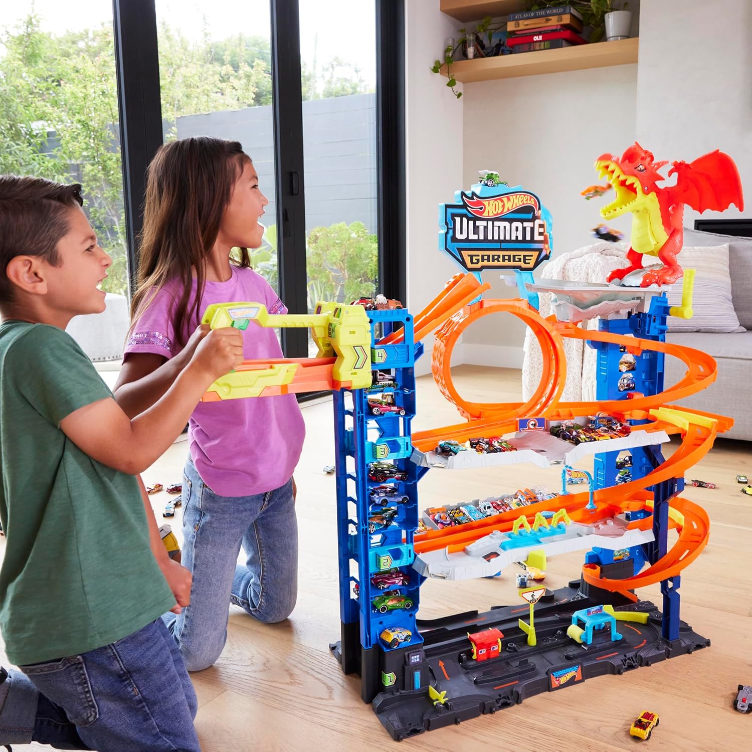 Hot Wheels City Ultimate Garage Playset avec dragon, ascenseur, boucle et 2 voitures