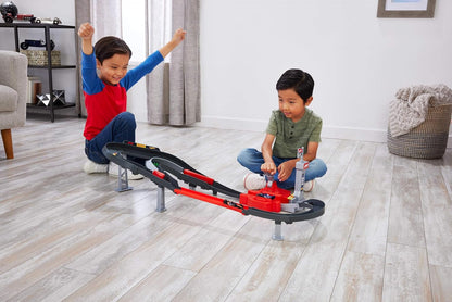 Hot Wheels - Circuit de course côte à côte de Formule 1 avec 3 voitures moulées sous pression