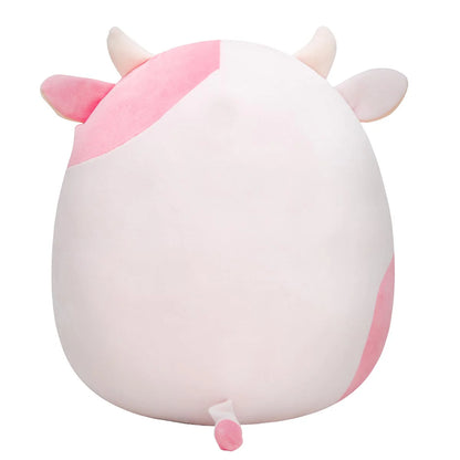 Squishmallows - Reshma la vache rose clair avec bandana violet